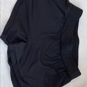 Grey and black Athleta shorts.